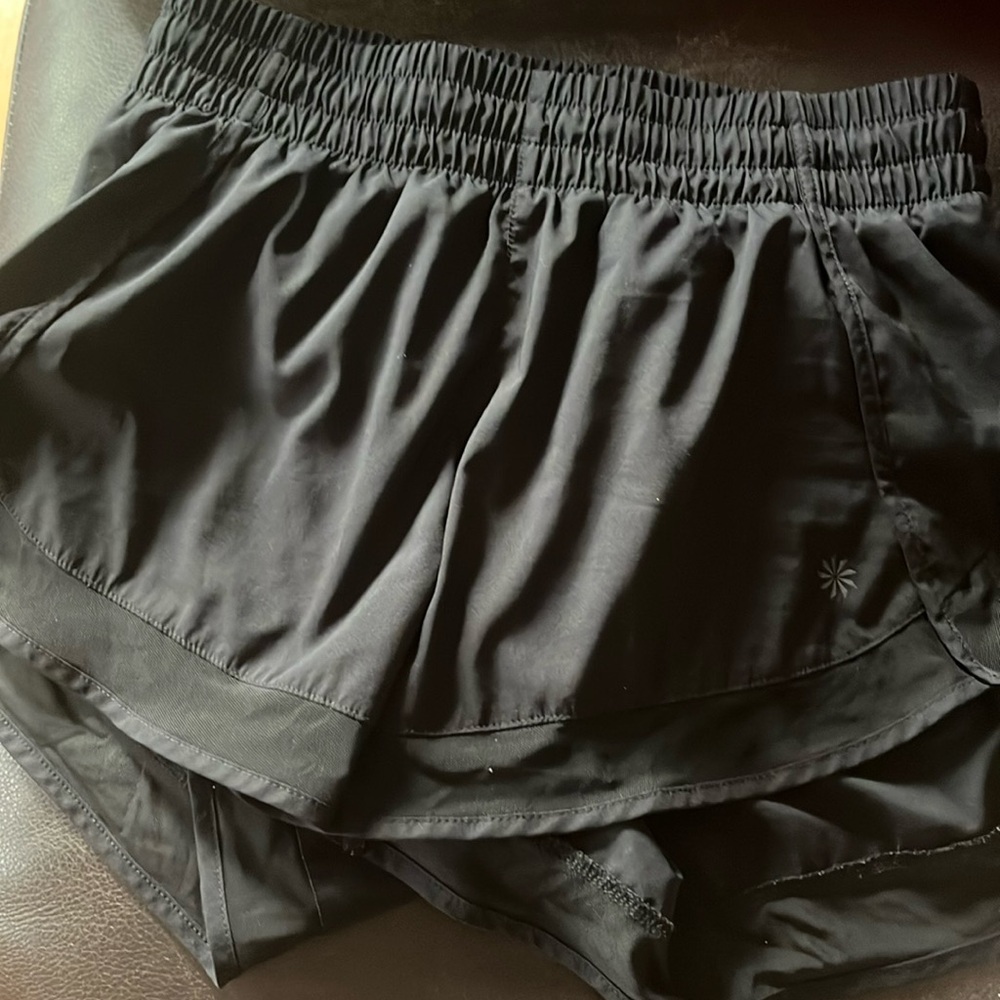 Athleta size XXS that fit like a Small.  EUC black shorts